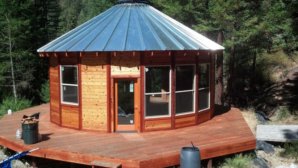 Showing our work on a yurt after Wood Staining